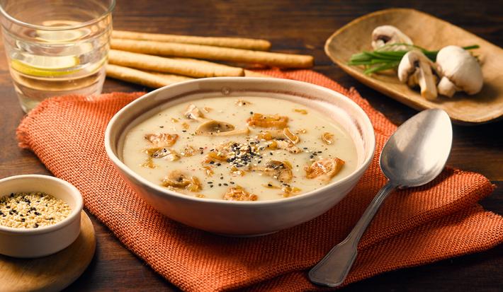 Crema de champiñones y cerdo al merkén